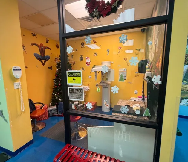 Panoramic dental imaging room with colorful wall art at Dental Fun Zone family dentist in El Paso, Texas